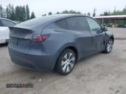 ✅ 2023 Tesla Model Y • VIN: 7SAYGDED0PF934319 • Lot: 42406718. Wystawiony na IAAI z przebiegiem 12 731 mil. Bezpłatny archiwum sprzedaży aukcyjnych z USA i szczegółowy raport historii pojazdu na DreamBid. Zdjęcie 4.