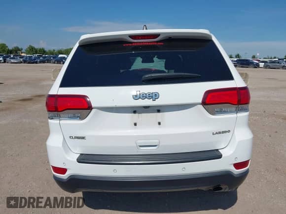 2021 Jeep Grand Cherokee Laredo E with VIN 1C4RJEAG1MC831072, listed as a IAAI auction lot 42993482 with 111,059 mi miles and . Bid and sale history available at DreamBid. Image 16.