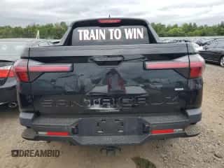 2022 Hyundai Santa Cruz SEL с VIN 5NTJBDAE7NH004395, выставлен на аукционе Copart как лот 68987174 с пробегом Не указан миль и Списание • Salvage title. История ставок и продаж доступна на DreamBid. Изображение 6.