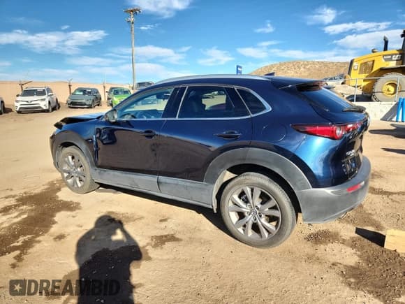 ✅ 2020 Mazda CX-30 Premium • VIN: 3MVDMBEM1LM129796 • Лот: 91221495. Опубликован ранее на Copart с пробегом 89 066 миль. Бесплатный доступ к архиву аукционных продаж из США и подробный отчёт об истории автомобиля на DreamBid. Изображение 2.