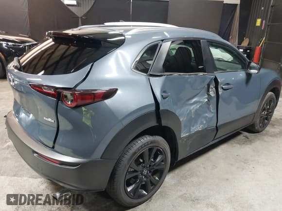✅ 2022 Mazda CX-30 S Carbon Edition • VIN: 3MVDMBCL8NM447234 • Lot: 42511600. Listed on IAAI with 51,926 mi. Free auction sales archive from the USA and detailed vehicle history report at DreamBid. Image 6.