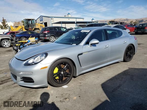 ✅ 2015 Porsche Panamera S E-Hybrid • VIN: WP0AD2A79FL040956 • Lot: 80707944. Listed on Copart with 74,001 mi. Free auction sales archive from the USA and detailed vehicle history report at DreamBid. Image 1.