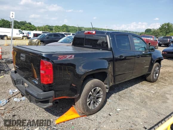 ✅ 2021 Chevrolet Colorado 4WD Z71 • VIN: 1GCGTDEN1M1112808 • Lot: 64644555. Listed on Copart with 84,751 mi. Free auction sales archive from the USA and detailed vehicle history report at DreamBid. Image 3.