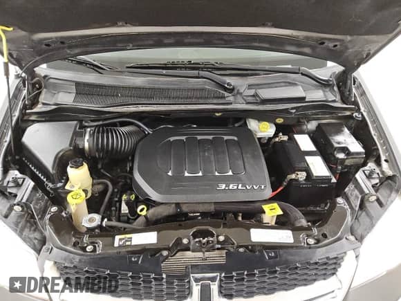 2018 Dodge Grand Caravan SXT z VIN 2C4RDGCG1JR328192, wystawiony jako Copart lot #86885835 z przebiegiem 334 507 mil mil oraz Czysty tytuł • Clean title. Historia ofert i sprzedaży dostępna na DreamBid. Obrazek 12.