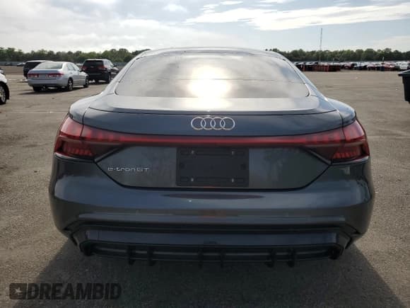 ✅ 2024 Audi e-tron GT Premium Plus • VIN: WAUFJBFWXR7003987 • Лот: 59656755. Опубликован ранее на Copart с пробегом 7 397 миль. Бесплатный доступ к архиву аукционных продаж из США и подробный отчёт об истории автомобиля на DreamBid. Изображение 6.