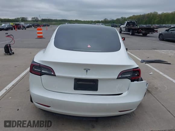 ✅ 2023 Tesla Model 3 • VIN: 5YJ3E1EA3PF563240 • Lot: 42190104. Listed on IAAI with 32,596 mi. Free auction sales archive from the USA and detailed vehicle history report at DreamBid. Image 17.