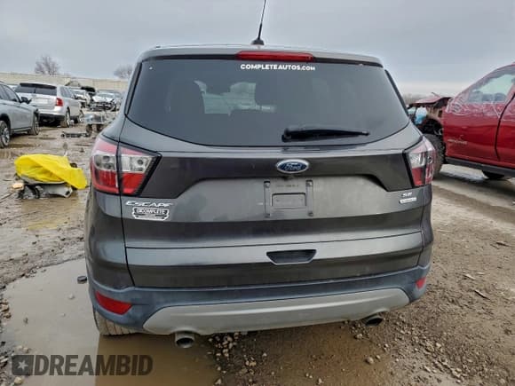 ✅ 2017 Ford Escape SE • VIN: 1FMCU0GD8HUD82014 • Lot: 95945805. Listed on Copart with 164,604 mi. Free auction sales archive from the USA and detailed vehicle history report at DreamBid. Image 6.