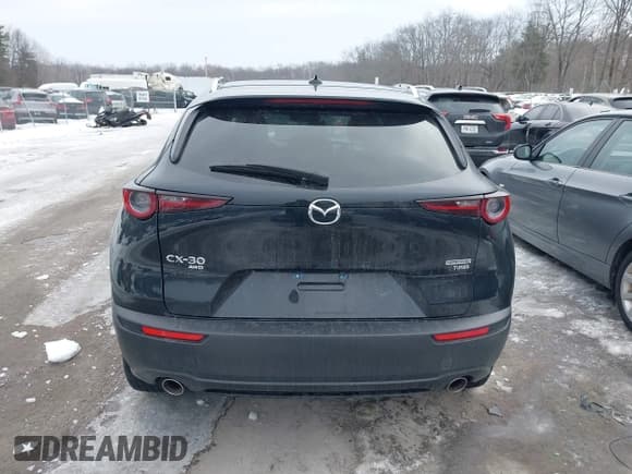 ✅ 2021 Mazda CX-30 Premium • VIN: 3MVDMBDY1MM269353 • Лот: 41644391. Опубликован ранее на IAAI с пробегом 29 409 миль. Бесплатный доступ к архиву аукционных продаж из США и подробный отчёт об истории автомобиля на DreamBid. Изображение 16.
