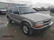 1999 Chevrolet Blazer LS z VIN 1GNDT13W7X2210017, wystawiony jako Copart lot #80454764 z przebiegiem 120 465 mil mil oraz Szkoda całkowita • Salvage title. Historia ofert i sprzedaży dostępna na DreamBid. Obrazek 4.