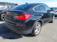 ✅ 2015 BMW X4 xDrive28i • VIN: 5UXXW3C51F0F89334 • Lot: 43589142. Listed on IAAI with 152,029 mi. Free auction sales archive from the USA and detailed vehicle history report at DreamBid. Image 4.