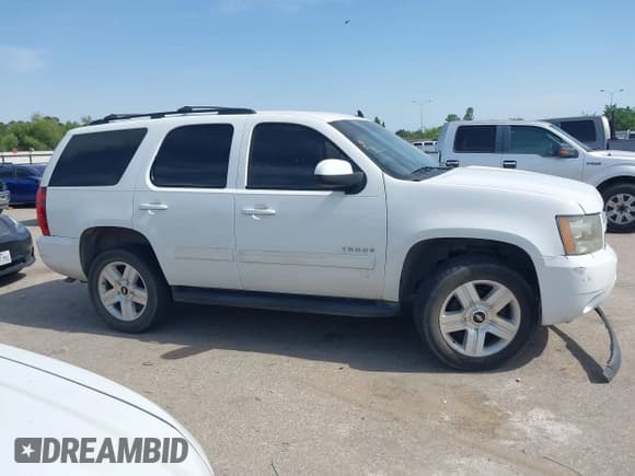 ✅ 2011 Chevrolet Tahoe LS • VIN: 1GNSKAE01BR308768 • Lot: 42262573. Listed on IAAI with 268,966 mi. Free auction sales archive from the USA and detailed vehicle history report at DreamBid. Image 13.