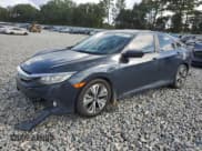 ✅ 2017 Honda Civic EX-T • VIN: 19XFC1F31HE005672 • Lot: 85140425. Wystawiony na Copart z przebiegiem 169 655 mil. Bezpłatny archiwum sprzedaży aukcyjnych z USA i szczegółowy raport historii pojazdu na DreamBid. Zdjęcie 1.