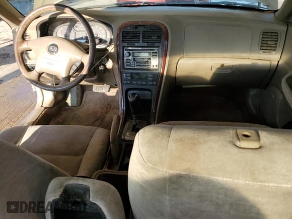 ✅ 2003 Kia Optima LX • VIN: KNAGD128X35248644 • Лот: 75536844. Опубликован ранее на Copart с пробегом 146 691 миль. Бесплатный доступ к архиву аукционных продаж из США и подробный отчёт об истории автомобиля на DreamBid. Изображение 8.