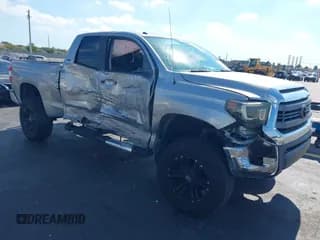 ✅ 2014 Toyota Tundra SR5 • VIN: 5TFRM5F18EX073513 • Lot: 43738760. Listed on IAAI with 92,586 mi. Free auction sales archive from the USA and detailed vehicle history report at DreamBid. Image 1.