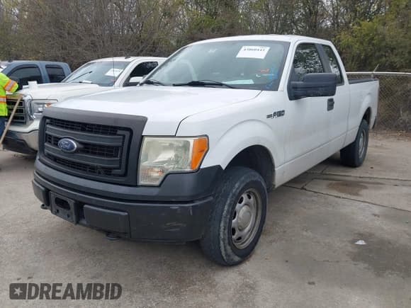✅ 2013 Ford F-150 STX • VIN: 1FTFX1EF8DKD97136 • Lot: 43860443. Listed on IAAI with 157,152 mi. Free auction sales archive from the USA and detailed vehicle history report at DreamBid. Image 2.