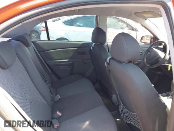 ✅ 2009 Kia Rio LX • VIN: KNADE223196547176 • Lot: 42754750. Wystawiony na IAAI z przebiegiem 111 006 mil. Bezpłatny archiwum sprzedaży aukcyjnych z USA i szczegółowy raport historii pojazdu na DreamBid. Zdjęcie 8.