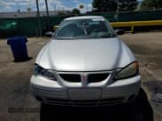 ✅ 2002 Pontiac Grand Am SE1 • VIN: 1G2NF52F12C254423 • Lot: 64235535. Listed on Copart with 198,587 mi. Free auction sales archive from the USA and detailed vehicle history report at DreamBid. Image 5.