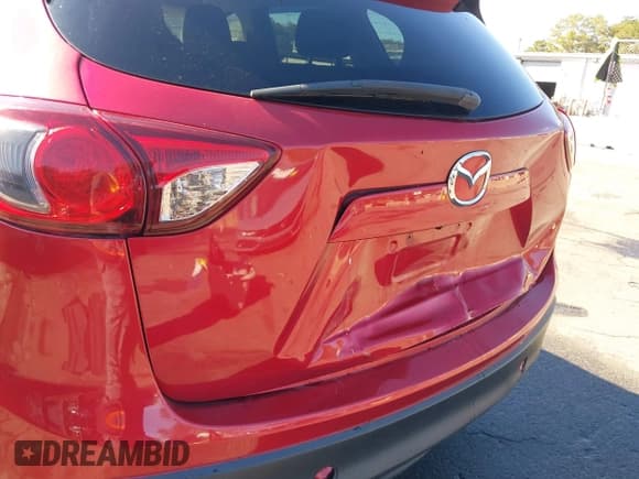 ✅ 2014 Mazda CX-5 Touring • VIN: JM3KE4CY1E0333406 • Lot: 43266877. Wystawiony na IAAI z przebiegiem 164 363 mil. Bezpłatny archiwum sprzedaży aukcyjnych z USA i szczegółowy raport historii pojazdu na DreamBid. Zdjęcie 6.
