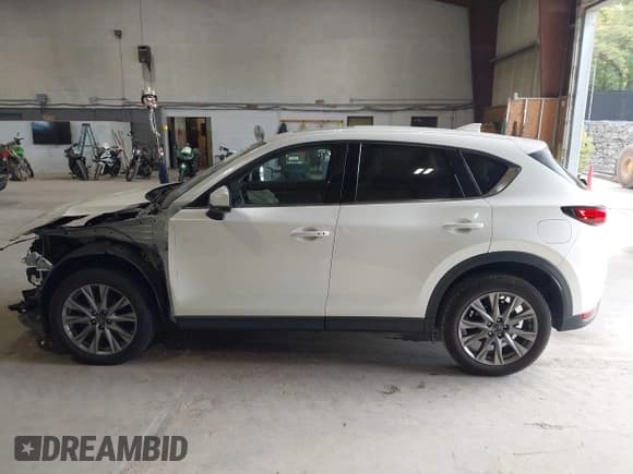 ✅ 2020 Mazda CX-5 Grand Touring • VIN: JM3KFBDMXL0868986 • Лот: 43154043. Опубликован ранее на IAAI с пробегом 56 480 миль. Бесплатный доступ к архиву аукционных продаж из США и подробный отчёт об истории автомобиля на DreamBid. Изображение 14.