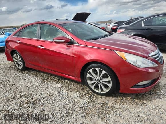 2014 Hyundai Sonata Limited with VIN 5NPEC4AB0EH832291, listed as a Copart auction lot 82044165 with 156,925 mi miles and Salvage title. Bid and sale history available at DreamBid. Image 4.