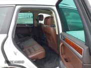 ✅ 2012 Volkswagen Touareg Sport • VIN: WVGEF9BP0CD006506 • Lot: 42355432. Wystawiony na IAAI z przebiegiem 175 346 mil. Bezpłatny archiwum sprzedaży aukcyjnych z USA i szczegółowy raport historii pojazdu na DreamBid. Zdjęcie 8.