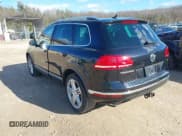 ✅ 2016 Volkswagen Touareg Lux • VIN: WVGEF9BP4GD001508 • Lot: 41850994. Wystawiony na IAAI z przebiegiem 63 355 mil. Bezpłatny archiwum sprzedaży aukcyjnych z USA i szczegółowy raport historii pojazdu na DreamBid. Zdjęcie 3.