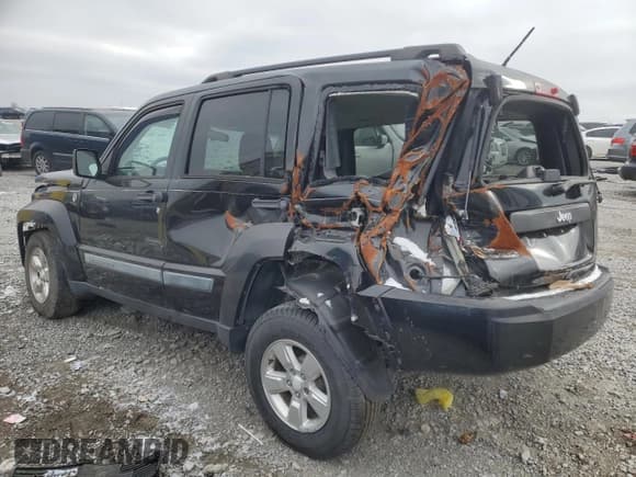 ✅ 2009 Jeep Liberty Sport • VIN: 1J8GN28K09W543353 • Lot: 84874065. Listed on Copart with Not provided. Free auction sales archive from the USA and detailed vehicle history report at DreamBid. Image 2.
