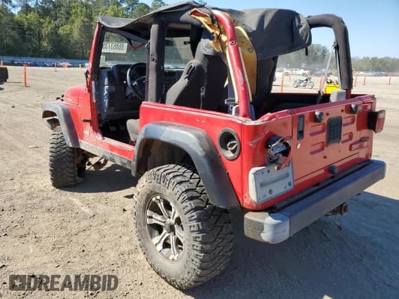 ✅ 2003 Jeep Wrangler Rubicon • VIN: 1J4FA69S43P373014 • Lot: 86863735. Listed on Copart with 120,127 mi. Free auction sales archive from the USA and detailed vehicle history report at DreamBid. Image 2.