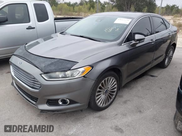 ✅ 2014 Ford Fusion Titanium • VIN: 3FA6P0D98ER100181 • Лот: 43613270. Опубликован ранее на IAAI с пробегом 254 207 миль. Бесплатный доступ к архиву аукционных продаж из США и подробный отчёт об истории автомобиля на DreamBid. Изображение 2.