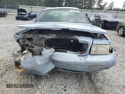 ✅ 1999 Ford Crown Victoria LX • VIN: 2FAFP74WXXX137154 • Lot: 71418784. Wystawiony na Copart z przebiegiem 97 589 mil. Bezpłatny archiwum sprzedaży aukcyjnych z USA i szczegółowy raport historii pojazdu na DreamBid. Zdjęcie 5.