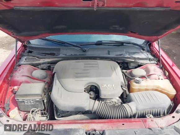 ✅ 2013 Dodge Challenger Rallye Redline • VIN: 2C3CDYAG6DH581635 • Lot: 41666837. Wystawiony na IAAI z przebiegiem 66 514 mil. Bezpłatny archiwum sprzedaży aukcyjnych z USA i szczegółowy raport historii pojazdu na DreamBid. Zdjęcie 10.