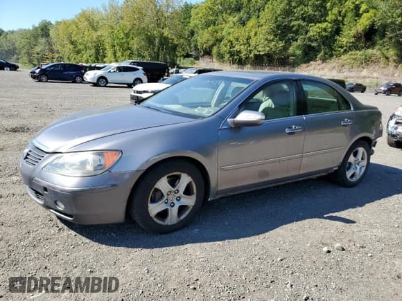 ✅ 2007 Acura RL • VIN: JH4KB16587C003893 • Лот: 70989345. Опубликован ранее на Copart с пробегом 170 255 миль. Бесплатный доступ к архиву аукционных продаж из США и подробный отчёт об истории автомобиля на DreamBid. Изображение 1.