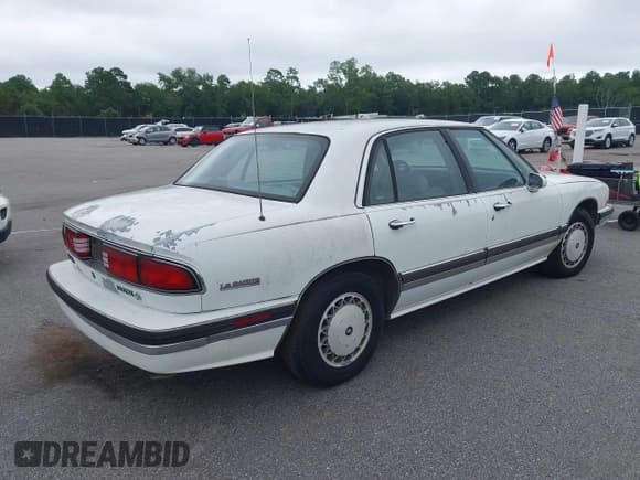 ✅ 1995 Buick LeSabre Limited • VIN: 1G4HR52L7SH523058 • Lot: 42916852. Listed on IAAI with 296,426 mi. Free auction sales archive from the USA and detailed vehicle history report at DreamBid. Image 4.