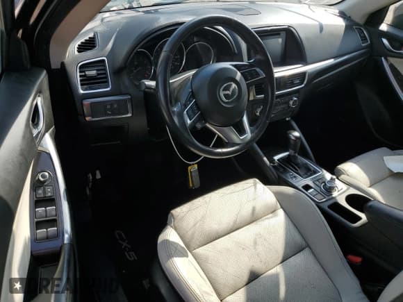 ✅ 2016 Mazda CX-5 Grand Touring • VIN: JM3KE2DY4G0761993 • Lot: 53204265. Wystawiony na Copart z przebiegiem 184 249 mil. Bezpłatny archiwum sprzedaży aukcyjnych z USA i szczegółowy raport historii pojazdu na DreamBid. Zdjęcie 8.