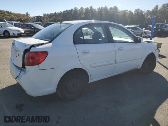✅ 2011 Kia Rio LX • VIN: KNADH4A31B6948446 • Lot: 76391634. Listed on Copart with 203,358 mi. Free auction sales archive from the USA and detailed vehicle history report at DreamBid. Image 3.