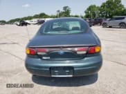 ✅ 1996 Ford Taurus GL • VIN: 1FALP52U8TG278359 • Lot: 83965335. Wystawiony na Copart z przebiegiem 186 708 mil. Bezpłatny archiwum sprzedaży aukcyjnych z USA i szczegółowy raport historii pojazdu na DreamBid. Zdjęcie 6.