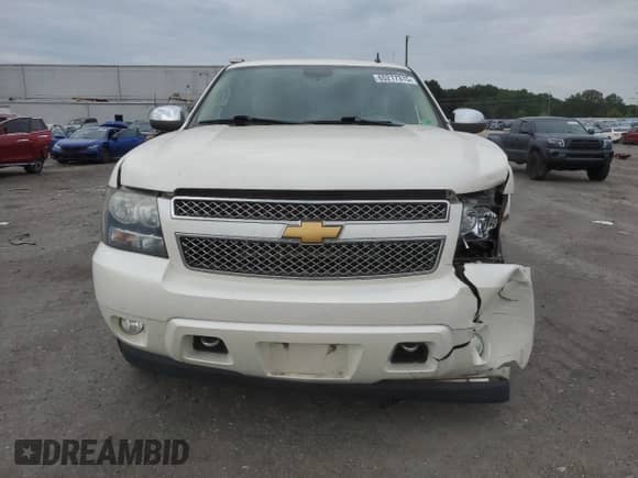 2013 Chevrolet Tahoe LTZ z VIN 1GNSKCE0XDR192002, wystawiony jako Copart lot #65217315 z przebiegiem 125 727 mil mil oraz Szkoda całkowita • Salvage title. Historia ofert i sprzedaży dostępna na DreamBid. Obrazek 5.