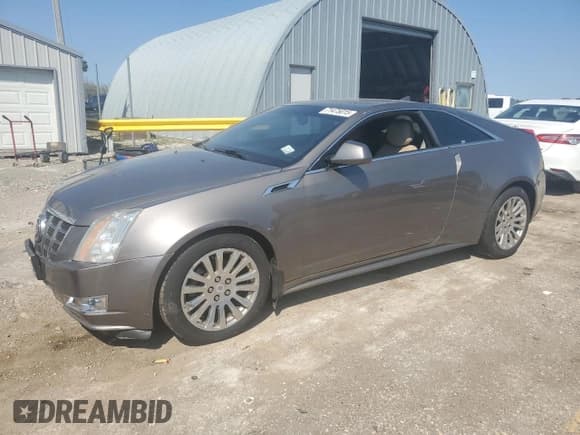 ✅ 2012 Cadillac CTS Premium • VIN: 1G6DS1E3XC0132808 • Lot: 71475015. Listed on Copart with 130,642 mi. Free auction sales archive from the USA and detailed vehicle history report at DreamBid. Image 1.