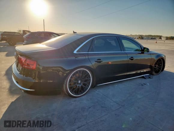 ✅ 2014 Audi A8 3.0L TDI • VIN: WAURMAFD4EN001333 • Lot: 84937525. Wystawiony na Copart z przebiegiem 169 302 mil. Bezpłatny archiwum sprzedaży aukcyjnych z USA i szczegółowy raport historii pojazdu na DreamBid. Zdjęcie 3.