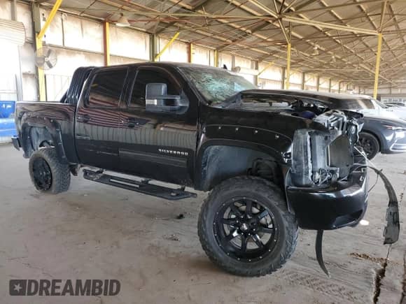 2013 Chevrolet Silverado 1500 LT с VIN 3GCPKSE74DG232774, выставлен на аукционе Copart как лот 85376485 с пробегом 183 767 миль миль и Списание • Salvage title. История ставок и продаж доступна на DreamBid. Изображение 4.