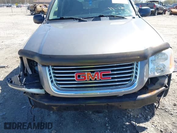 ✅ 2006 GMC Envoy SLE • VIN: 1GKDT13S662122195 • Lot: 42228257. Listed on IAAI with 177,365 mi. Free auction sales archive from the USA and detailed vehicle history report at DreamBid. Image 6.