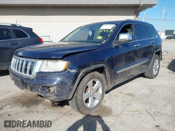 ✅ 2013 Jeep Grand Cherokee Laredo • VIN: 1C4RJFAG0DC501686 • Lot: 43555997. Listed on IAAI with 161,404 mi. Free auction sales archive from the USA and detailed vehicle history report at DreamBid. Image 2.