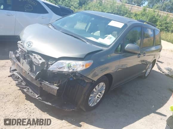 2011 Toyota Sienna XLE AAS with VIN 5TDYK3DC8BS073331, listed as a IAAI auction lot 43099376 with 145,679 mi miles and . Bid and sale history available at DreamBid. Image 17.