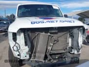 ✅ 2016 Nissan NV S • VIN: 1N6BF0KM4GN808661 • Lot: 43751723. Listed on IAAI with 122,067 mi. Free auction sales archive from the USA and detailed vehicle history report at DreamBid. Image 13.