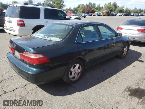 2000 Honda Accord EX с VIN 1HGCG6673YA110192, выставлен на аукционе Copart как лот 68926755 с пробегом 214 551 миль миль и Списание • Salvage title. История ставок и продаж доступна на DreamBid. Изображение 3.