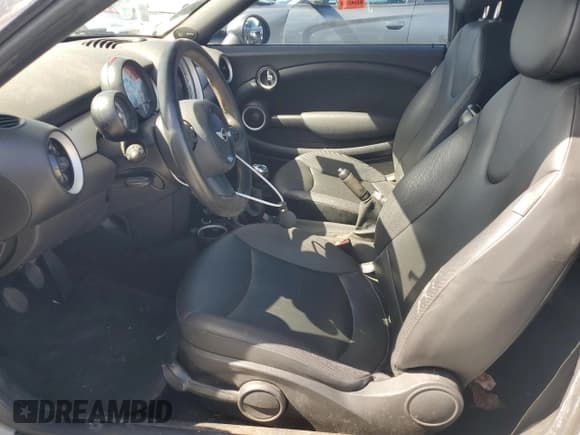 ✅ 2014 MINI Roadster • VIN: WMWSY1C50ET719556 • Lot: 65177525. Listed on Copart with 64,689 mi. Free auction sales archive from the USA and detailed vehicle history report at DreamBid. Image 7.