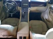 ✅ 2015 Ford Taurus Limited • VIN: 1FAHP2F81FG165617 • Lot: 94509095. Listed on Copart with Not provided. Free auction sales archive from the USA and detailed vehicle history report at DreamBid. Image 8.