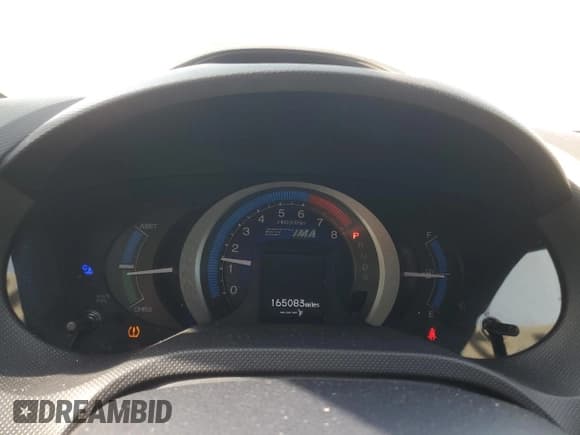 ✅ 2010 Honda Insight EX • VIN: JHMZE2H77AS035113 • Lot: 54179005. Listed on Copart with 165,083 mi. Free auction sales archive from the USA and detailed vehicle history report at DreamBid. Image 9.