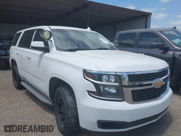 ✅ 2015 Chevrolet Tahoe Commercial • VIN: 1GNLC2EC4FR601930 • Lot: 42784289. Wystawiony na IAAI z przebiegiem 209 292 mil. Bezpłatny archiwum sprzedaży aukcyjnych z USA i szczegółowy raport historii pojazdu na DreamBid. Zdjęcie 1.