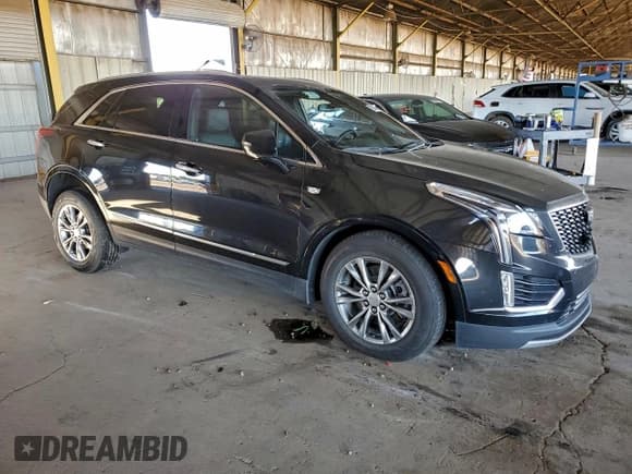 ✅ 2023 Cadillac XT5 AWD Premium Luxury • VIN: 1GYKNDRSXPZ133970 • Lot: 96274935. Wystawiony na Copart z przebiegiem 92 152 mil. Bezpłatny archiwum sprzedaży aukcyjnych z USA i szczegółowy raport historii pojazdu na DreamBid. Zdjęcie 4.